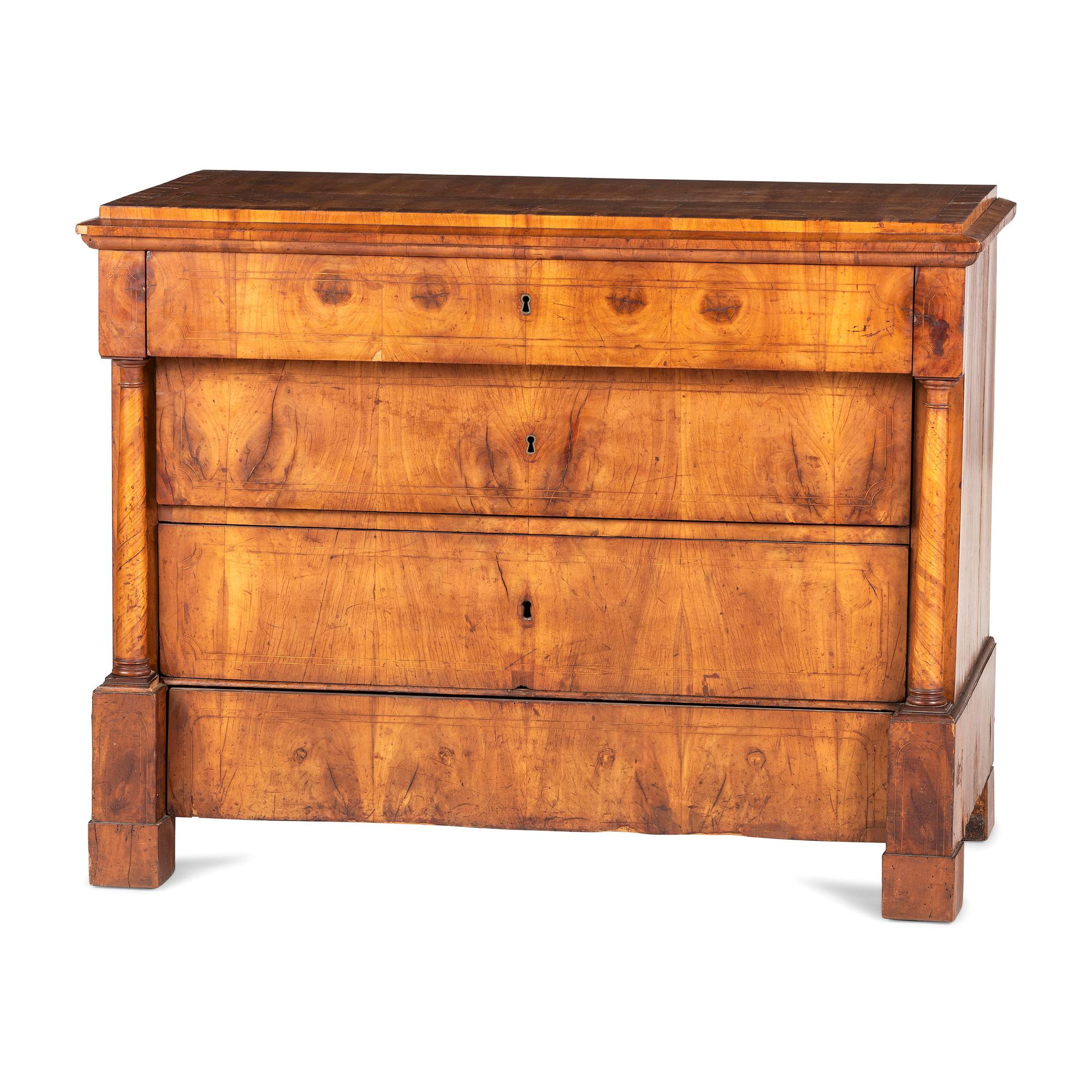A Biedermeier Figured Walnut Chest of Drawers