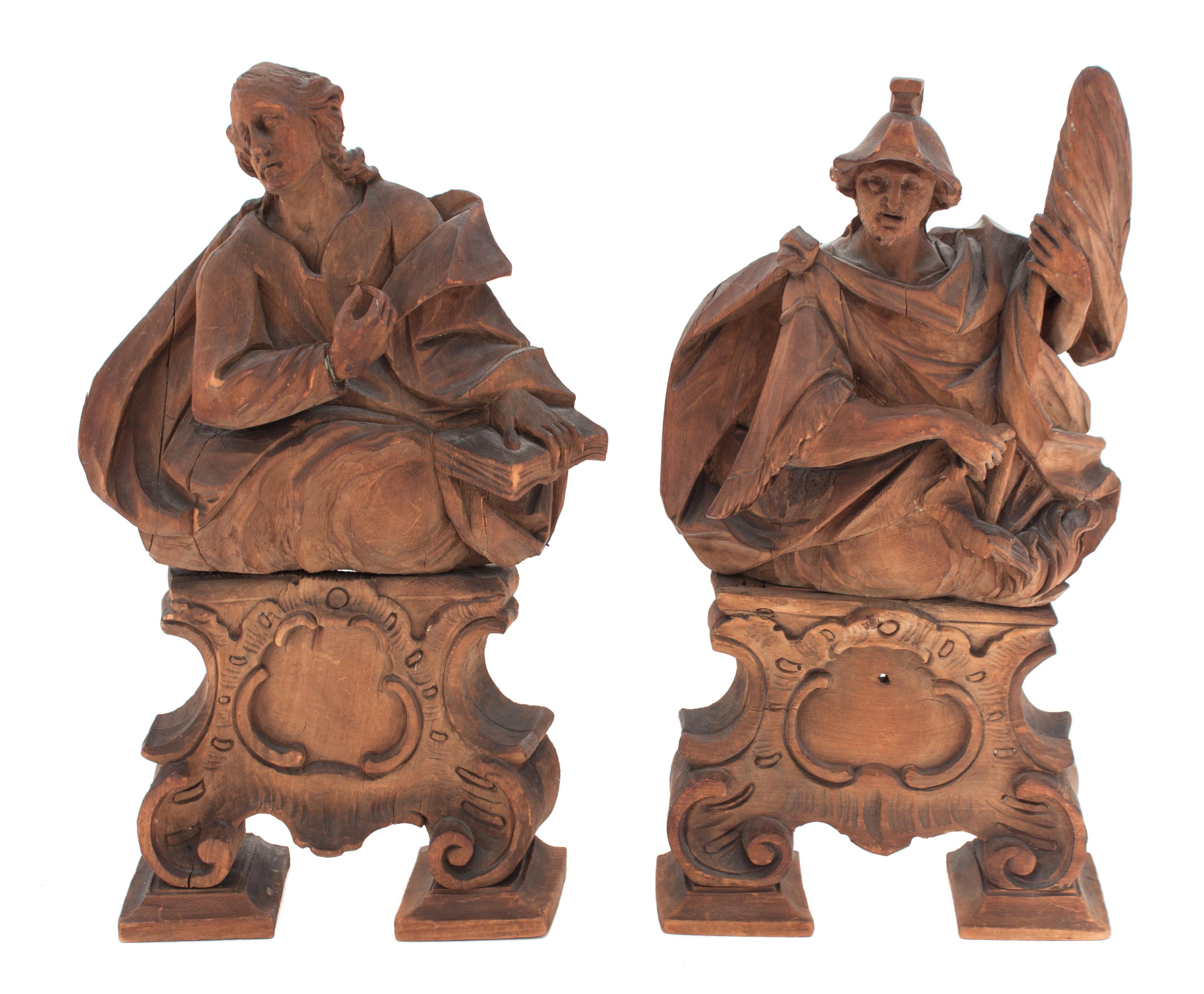 Two Carved Wood Articles Height 13 inches.