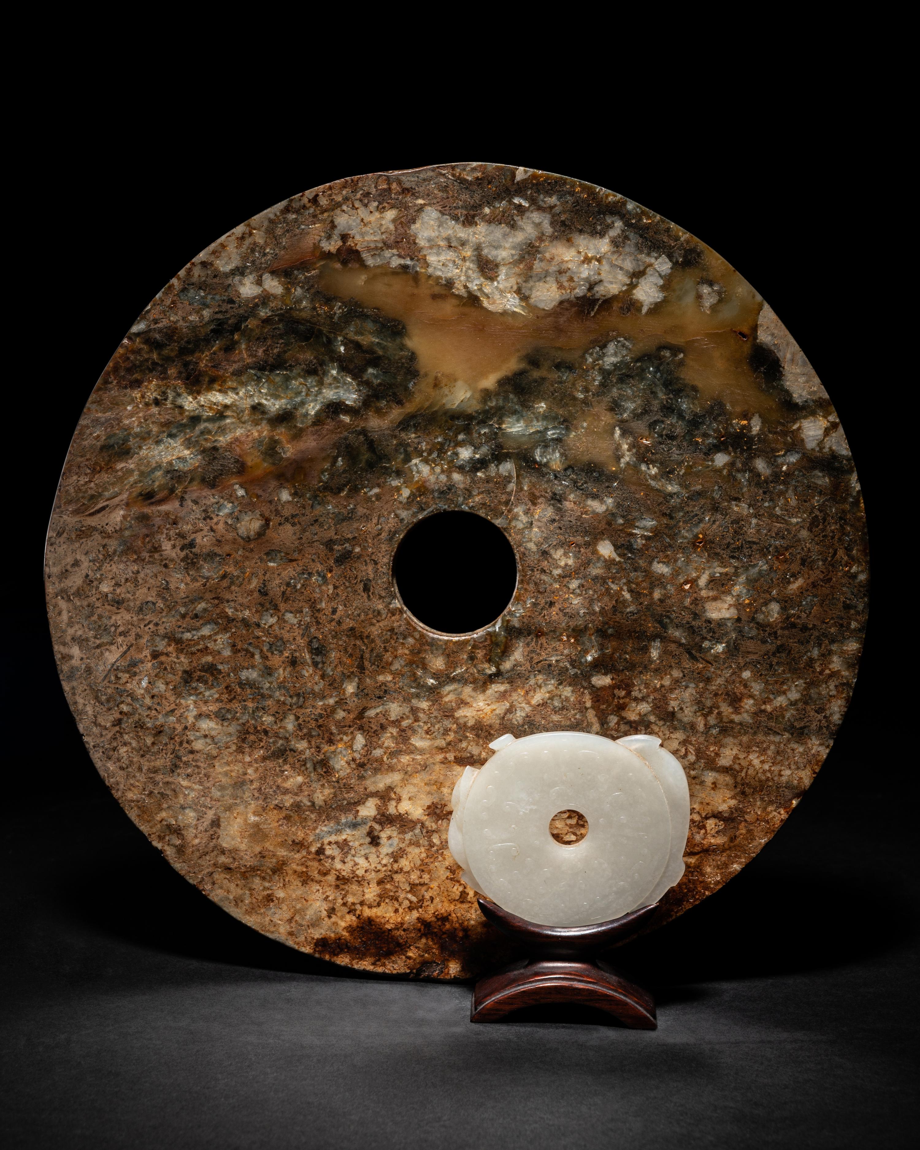 A Chinese Carved White Jade 'Chilong' Pendant and and Archaistic Jade Bi Disc