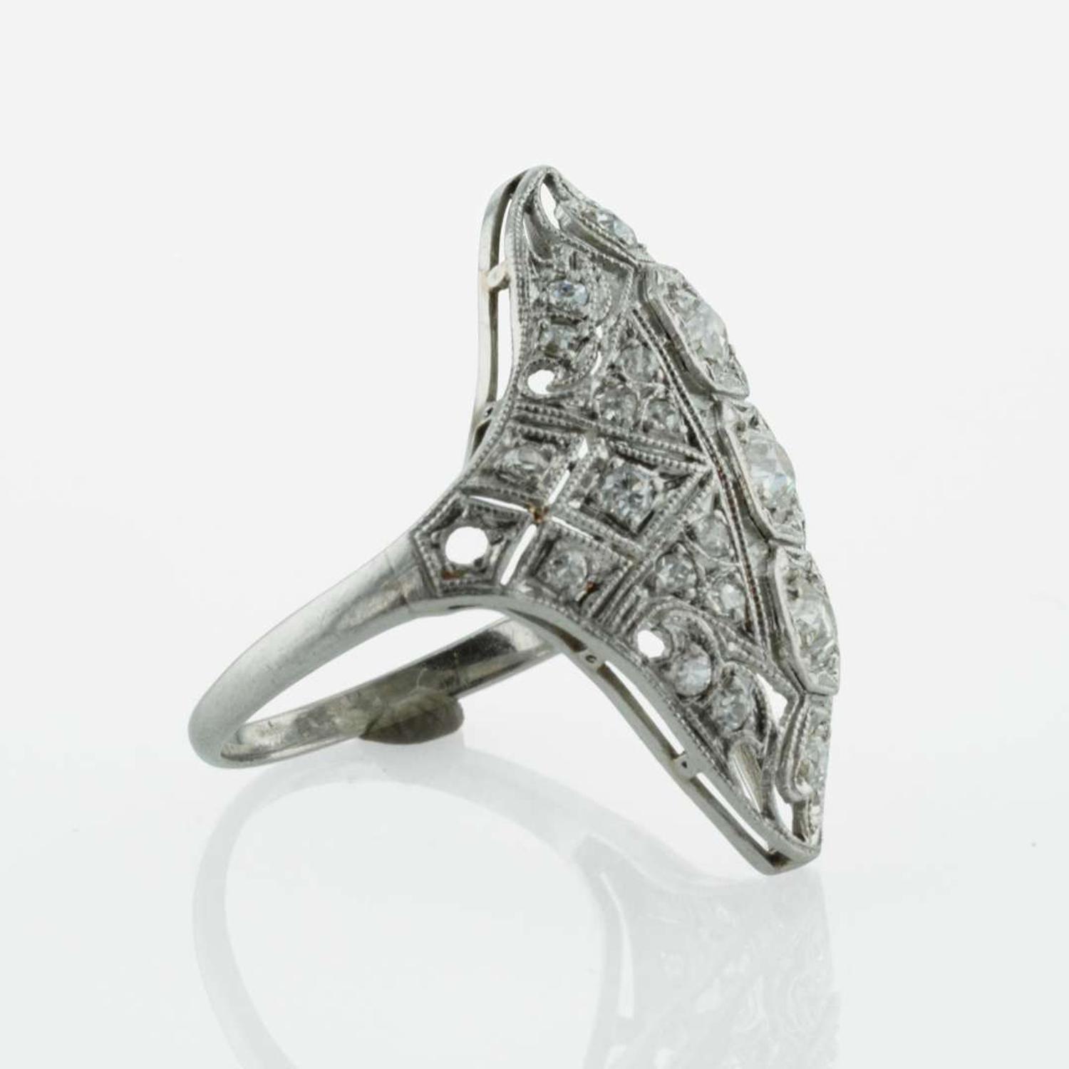 An Art Deco Platinum and Diamond Ring
