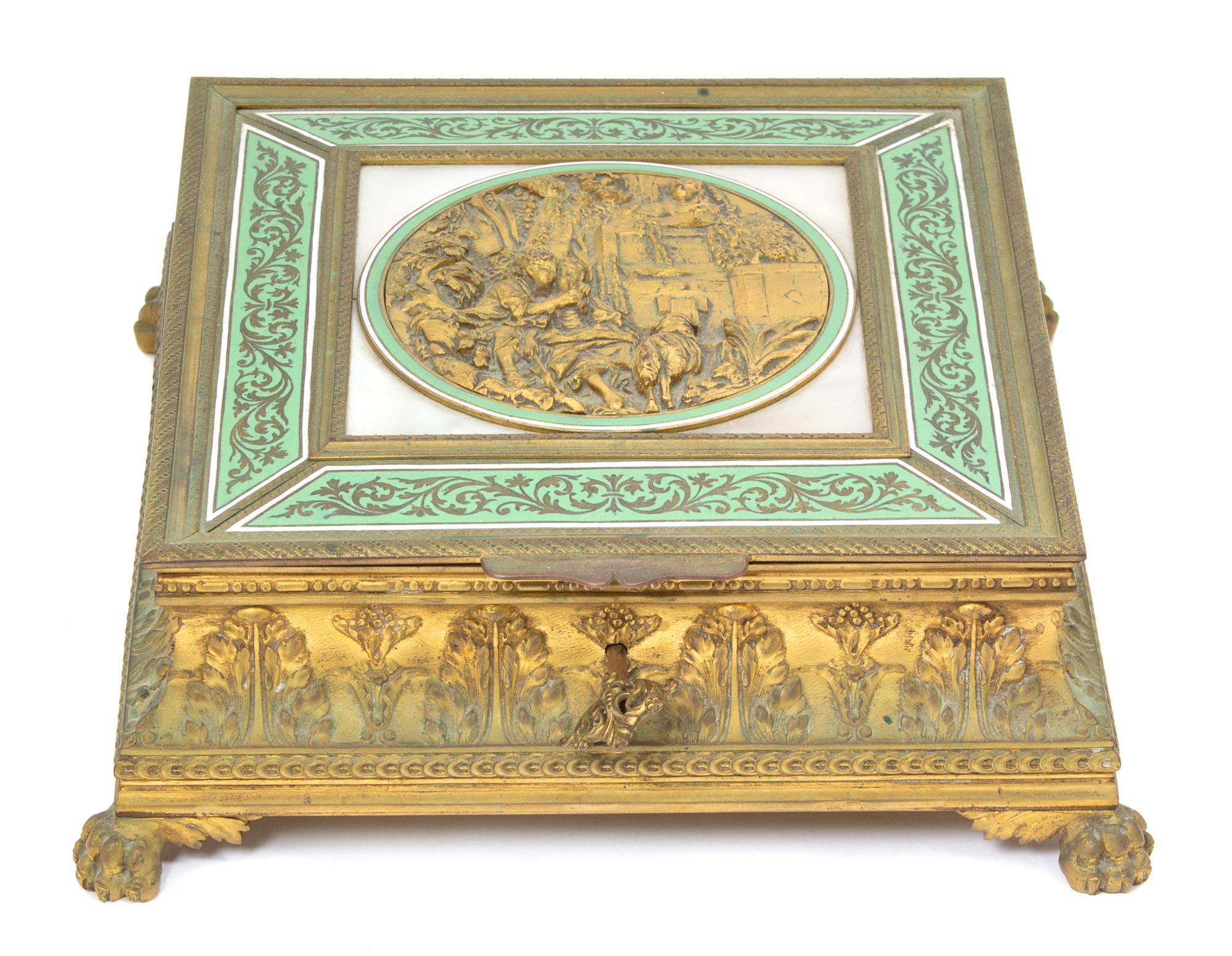 A French Gilt Bronze Covered Box with Enamel Decoration Height 3 x width 8 1/2 x depth 8 1/2 inches. — 19TH CENTURY