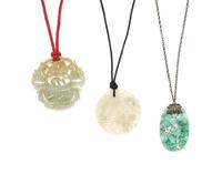 Three Jadeite Pendants Diameter of largest 2 1/4 inches.