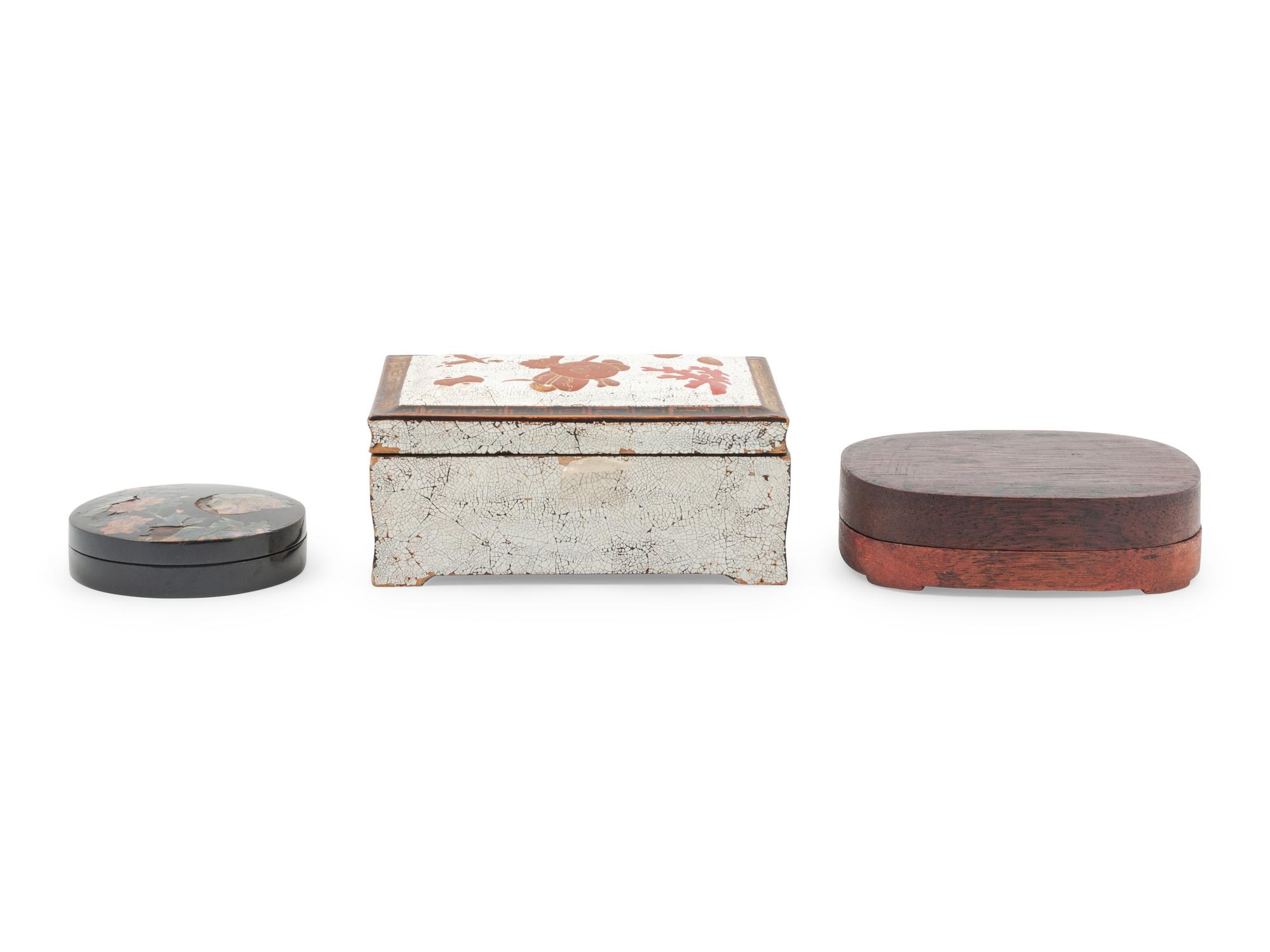 A Group of Three Covered Boxes