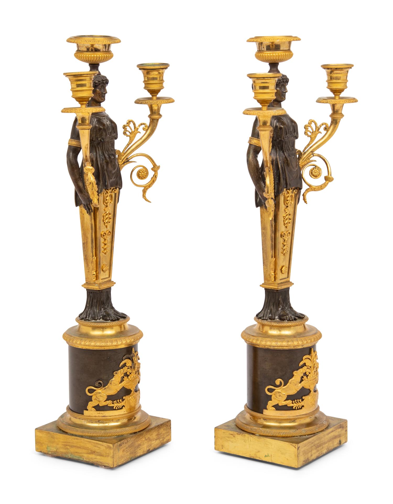 A Pair of Restauration Ormolu and Patinated Bronze Figural Three-Light Candelabra