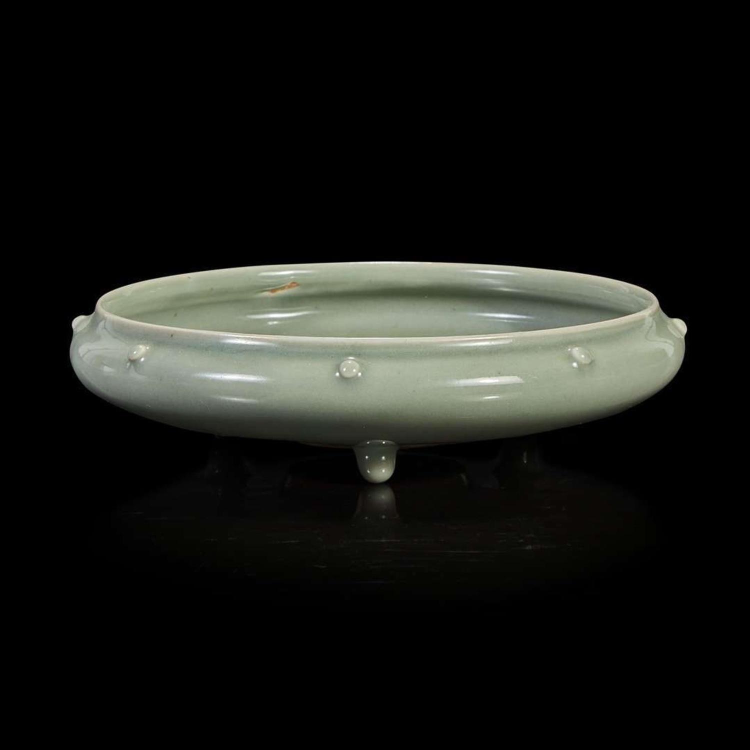 A Chinese celadon-glazed tripod brush washer