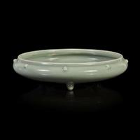 A Chinese celadon-glazed tripod brush washer
