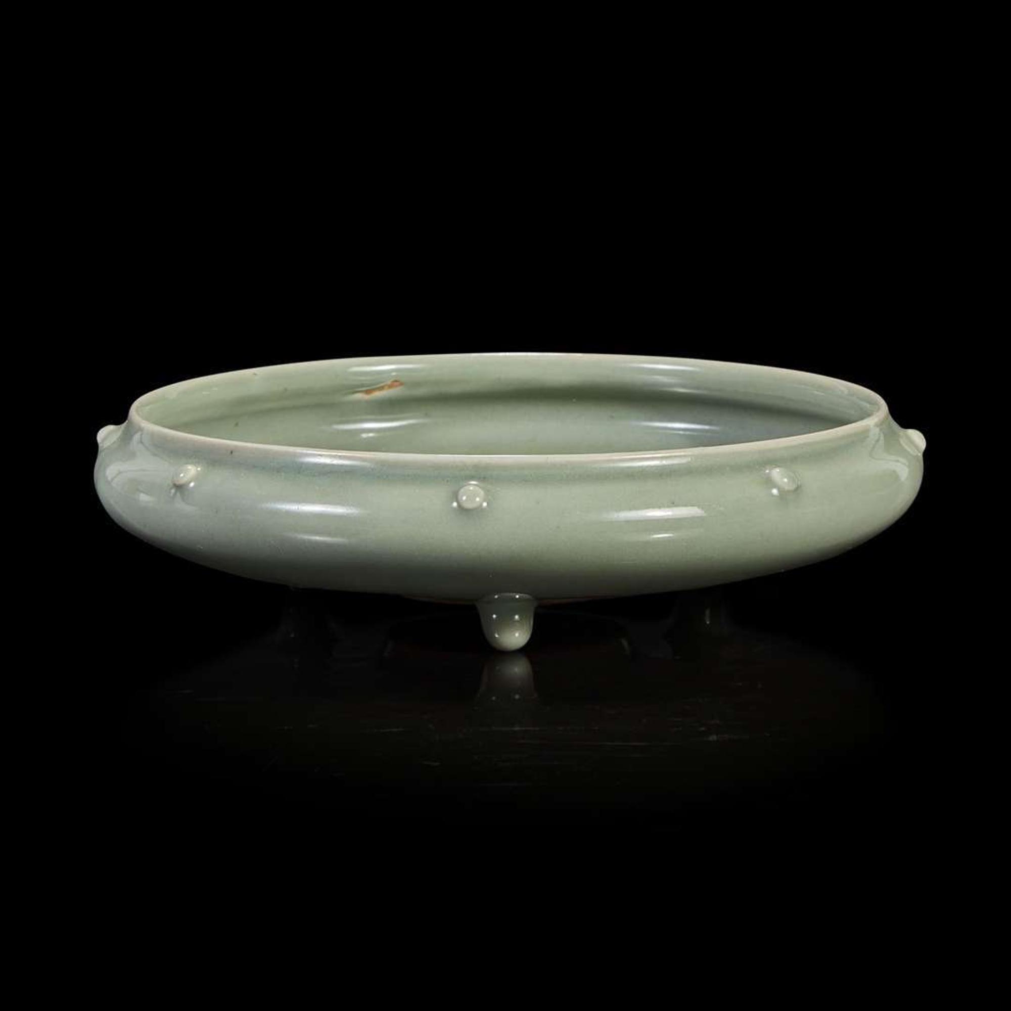 A Chinese celadon-glazed tripod brush washer