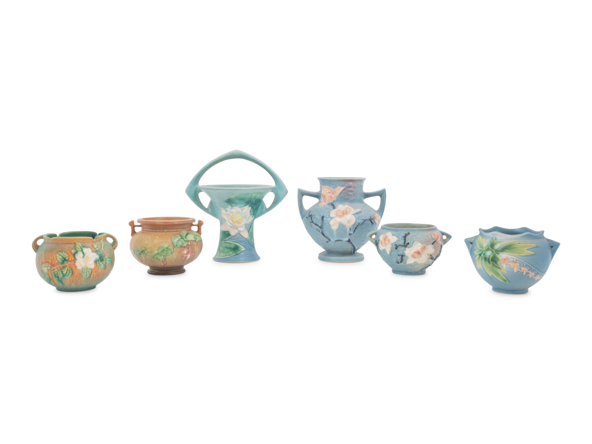Twelve Roseville Pottery Articles
