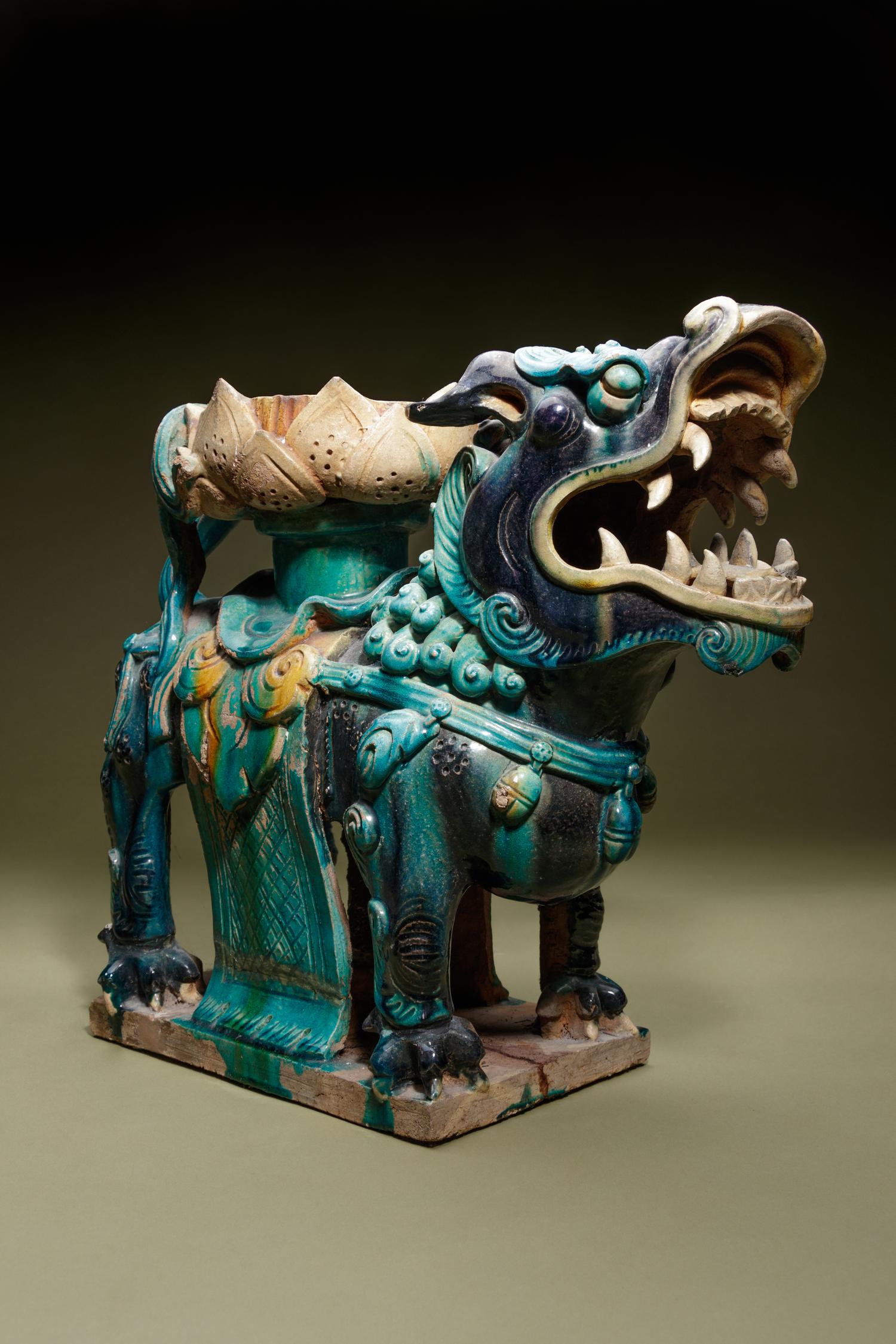 A Turquoise, Blue and Yellow Glazed Tilewoks 'Lion' Stand