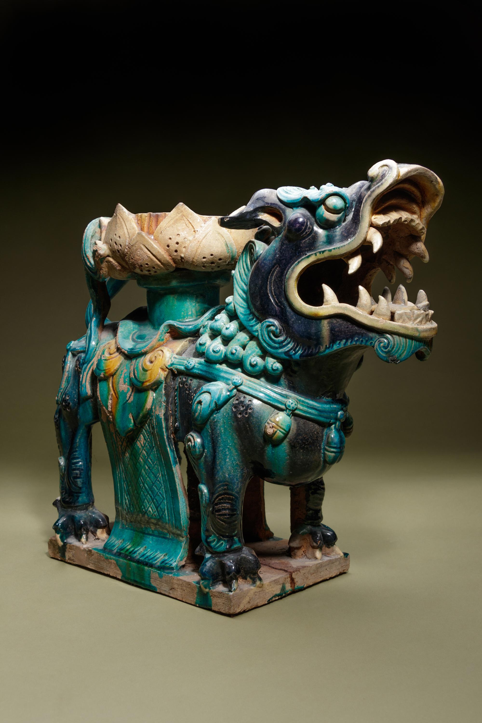 A Turquoise, Blue and Yellow Glazed Tilewoks 'Lion' Stand