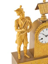 A Charles X Gilt Bronze Mantel Clock