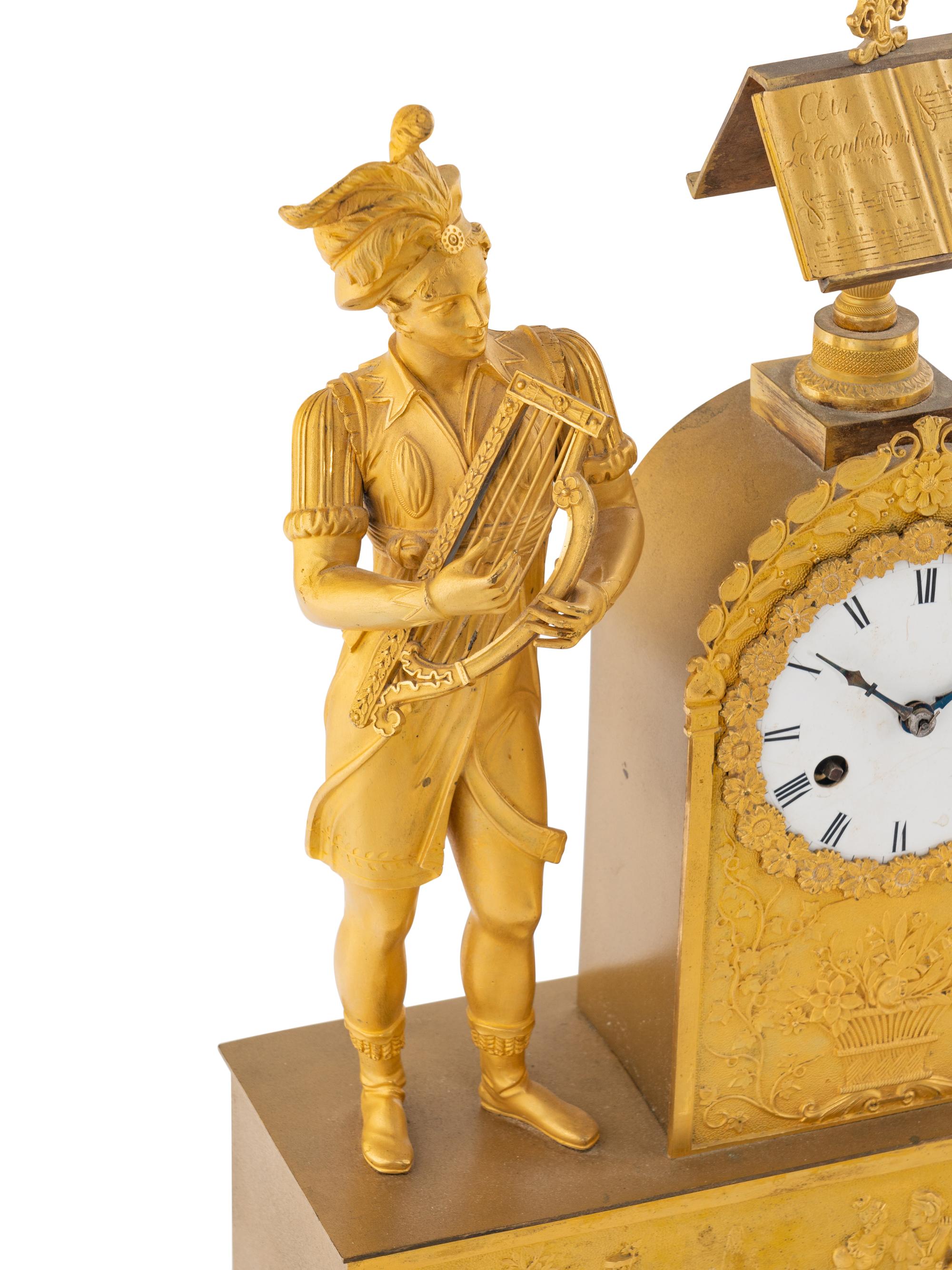 A Charles X Gilt Bronze Mantel Clock