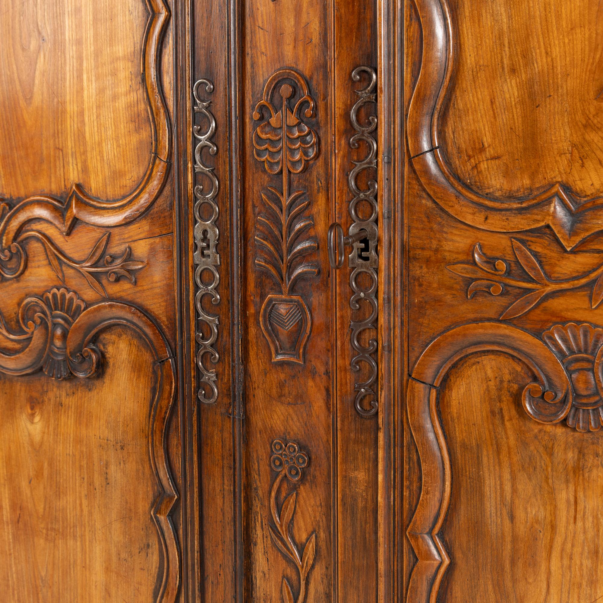 A Louis XV Provincial Walnut Armoire
