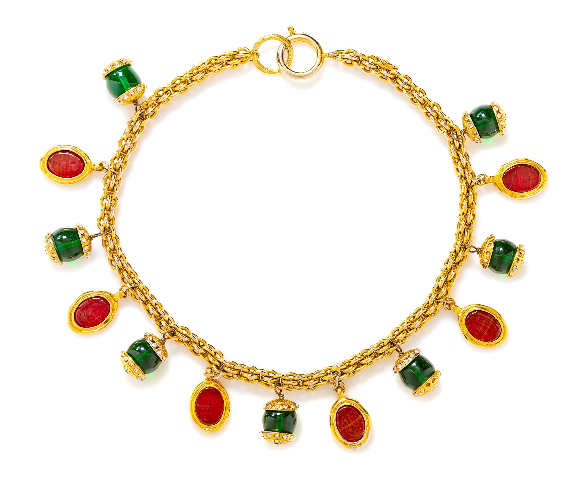 A Chanel Goldtone Gripoix Charm Necklace, Length: 15.5"; Charms: .75" x .5".