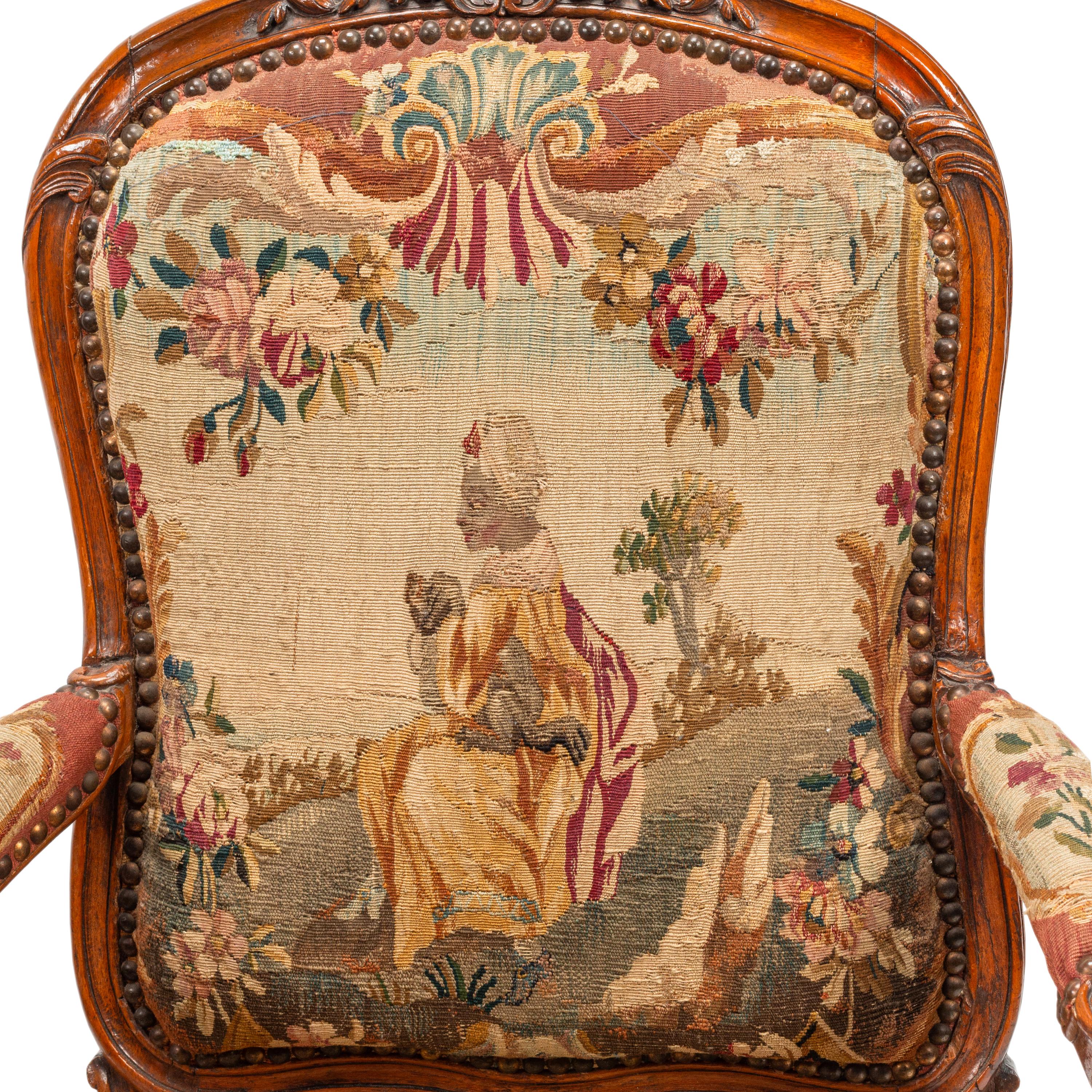 A Set of Four Louis XV Tapestry-Upholstered Armchairs