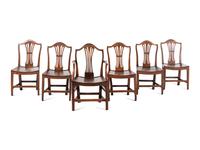 A Set of Six English Carved Oak Dining Chairs