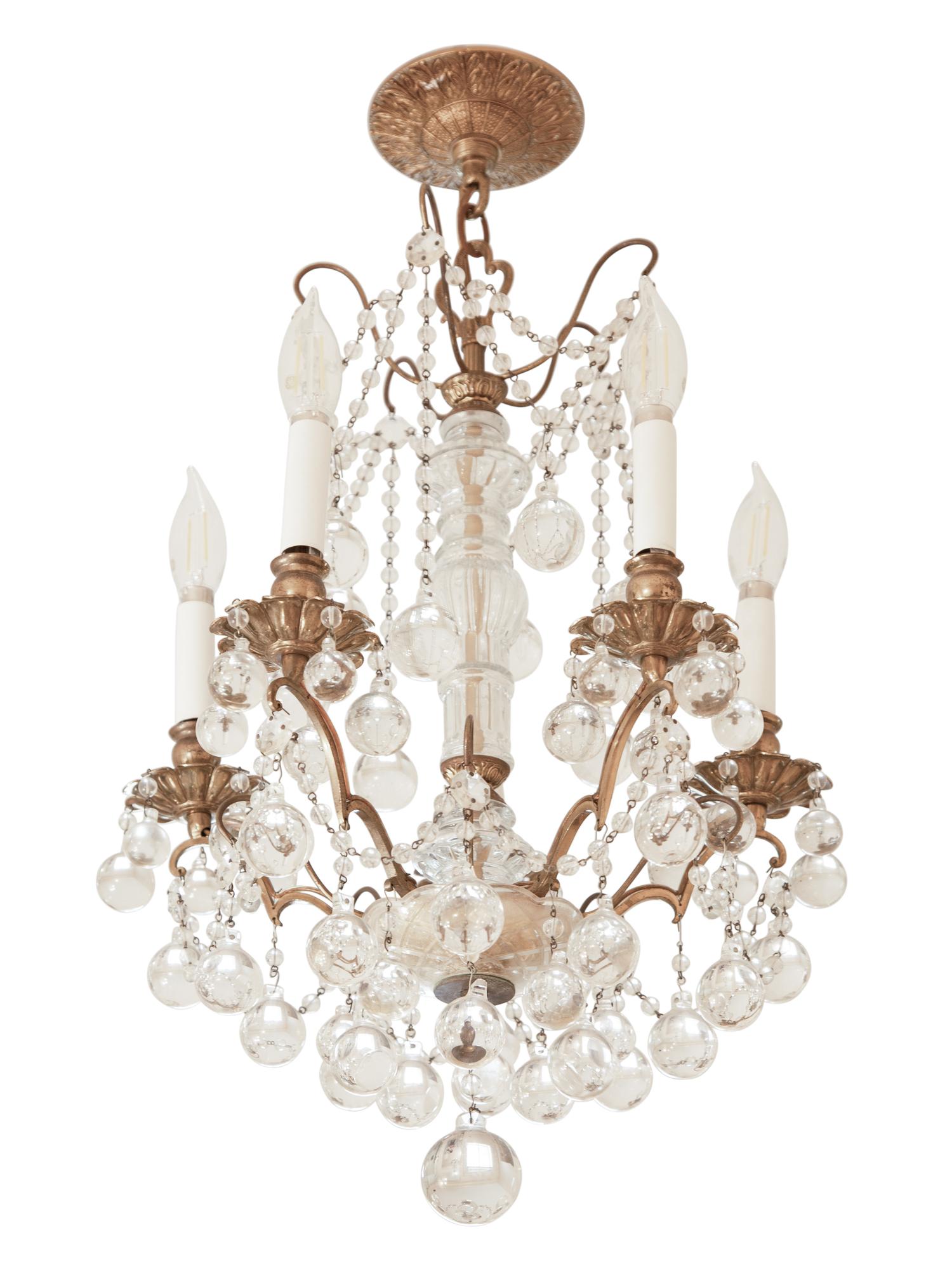 A French Gilt Bronze and Cut Glass Five-Light Chandelier