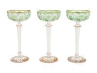 A Group of Three Art Nouveau Parcel-Gilt and Cut-to-Clear Glass Champagne Coupes