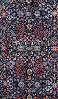 A Hereke Wool Rug