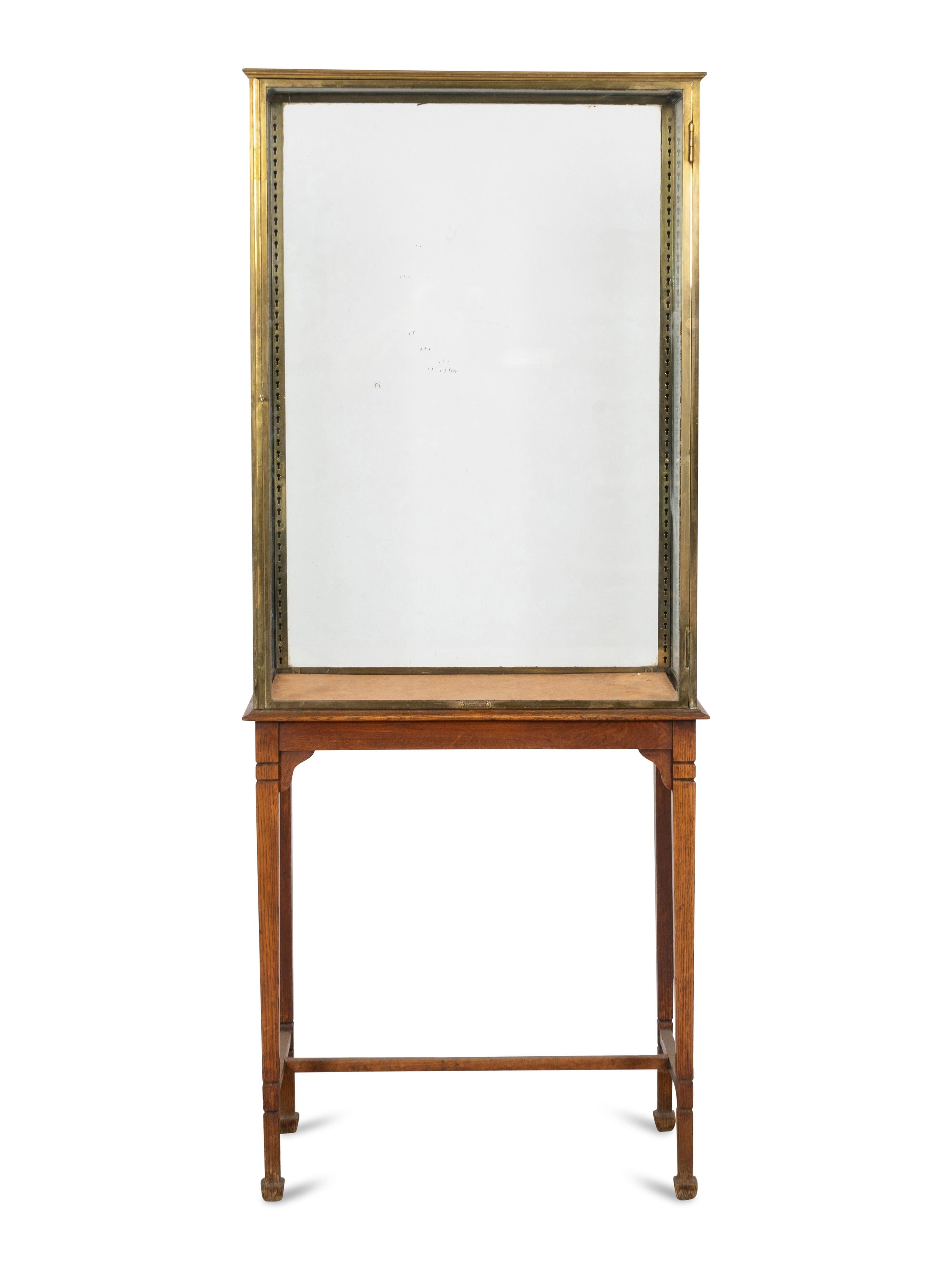 An A. Ravenel Parisian Brass and Glass Retailer's Window Vitrine on Oak Stand