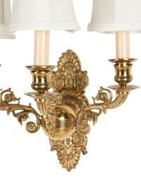 A Pair of Empire Style Brass Three-Light Sconces