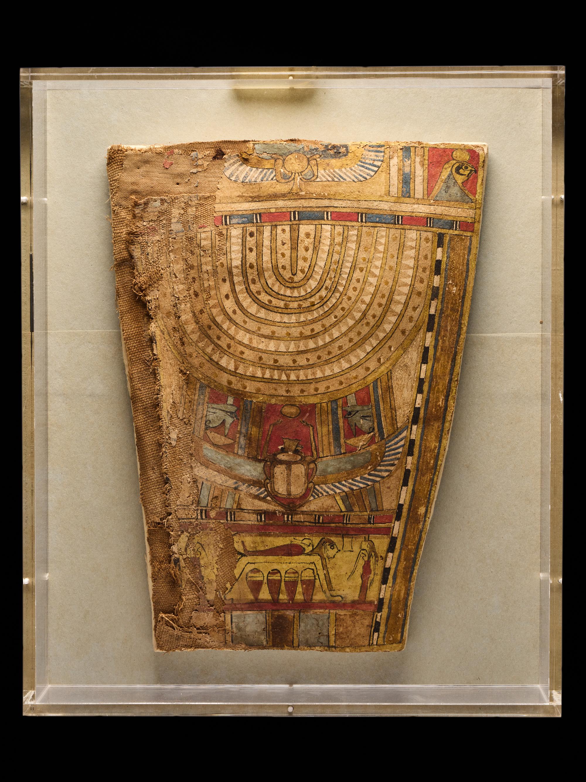 An Egyptian Painted Cartonnage Sarcophagus Fragment