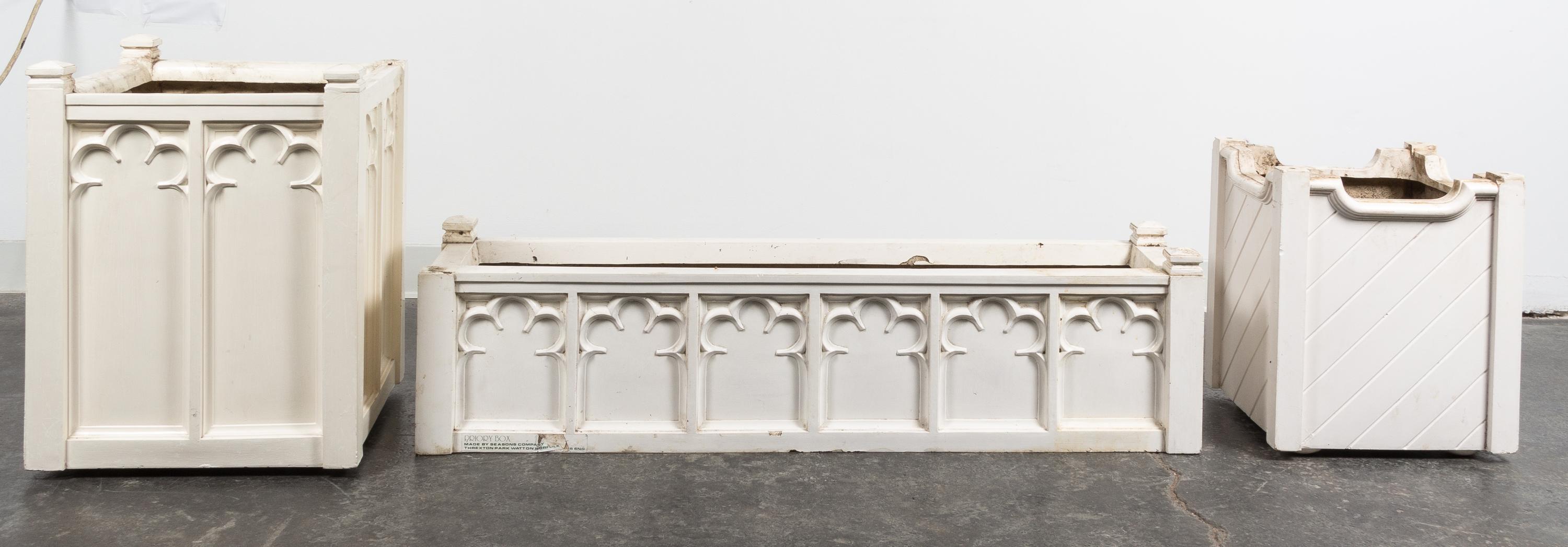 A Group of Three Fiberglass Jardinieres Width of largest 44 inches.
