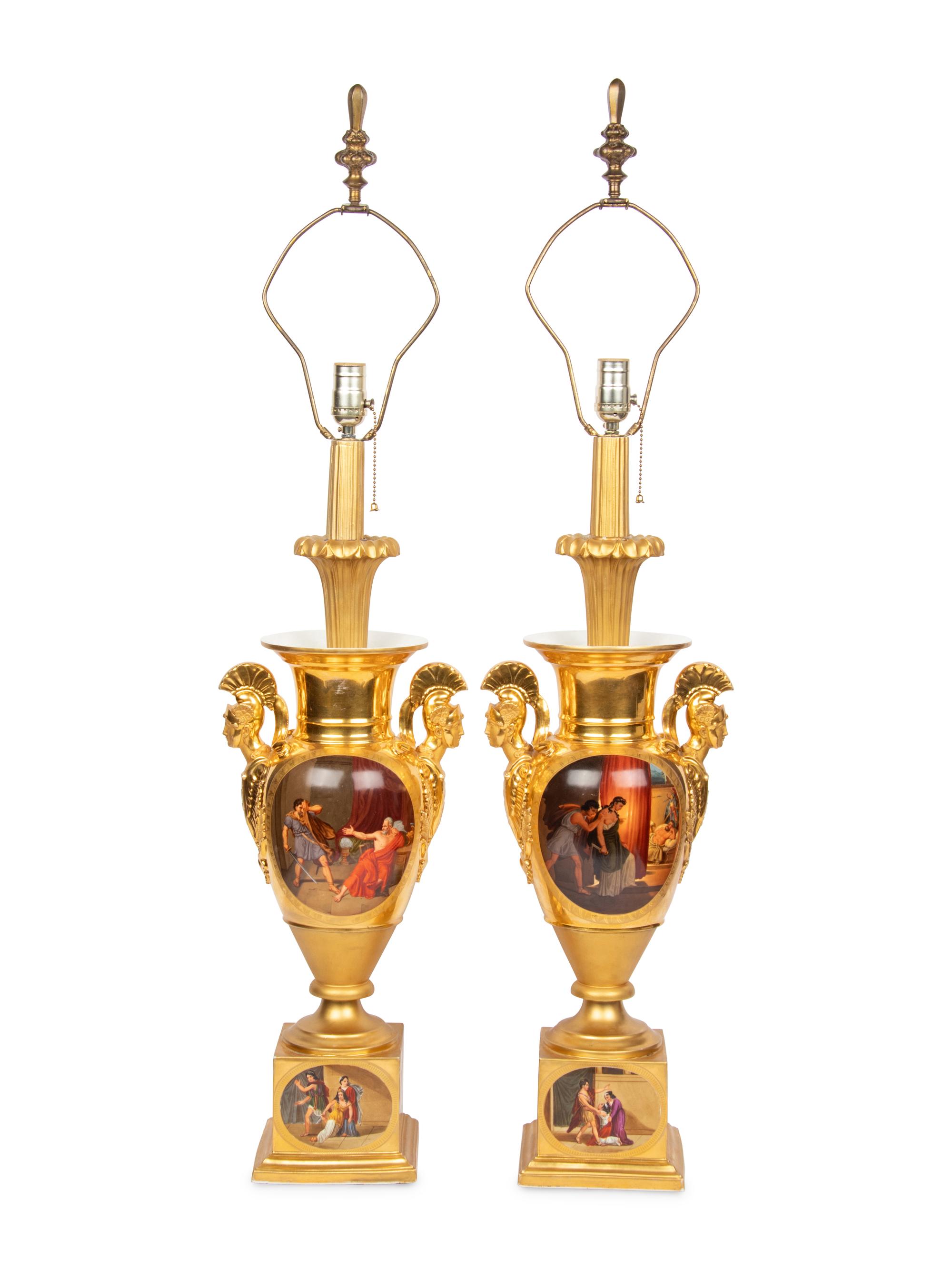 A Pair of Empire Style Painted and Parcel Gilt Porcelain Urns
