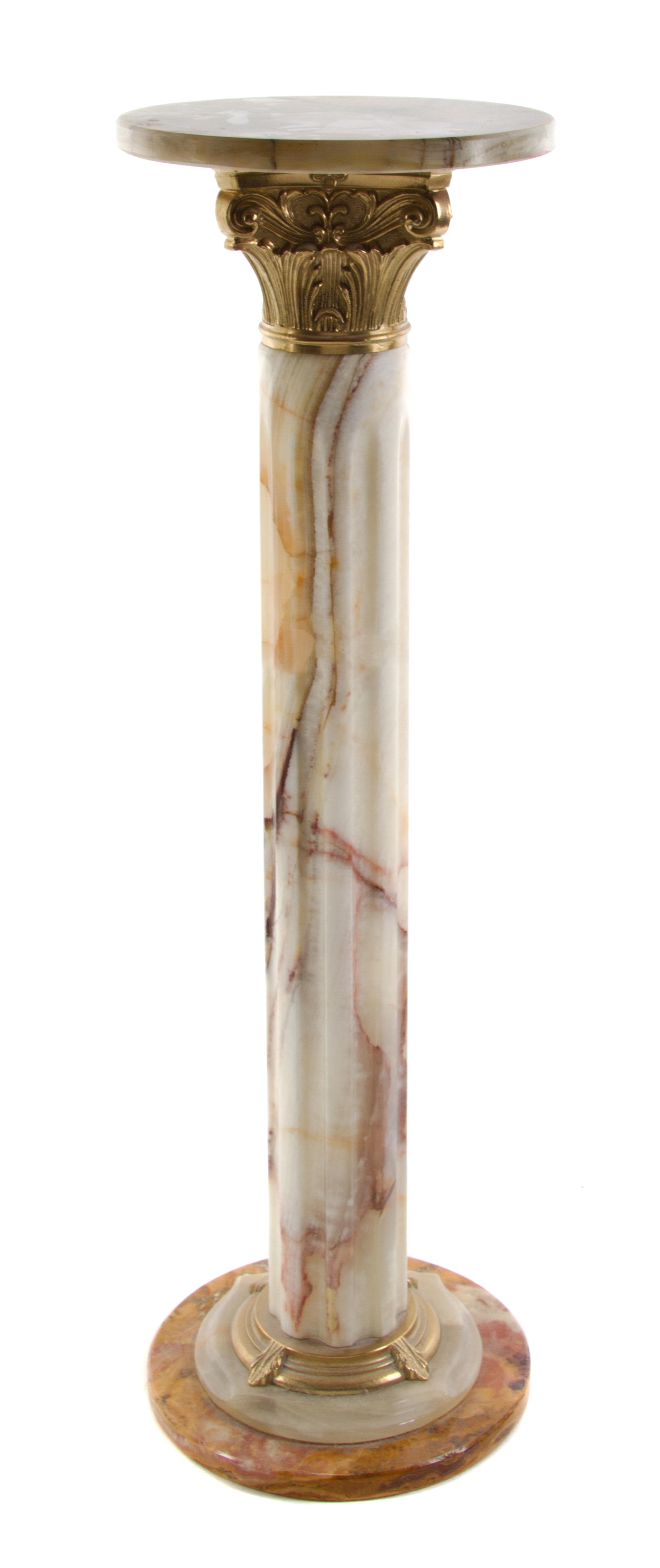 A Gilt Metal Mounted Onyx Pedestal Height 37 1/2 inches.