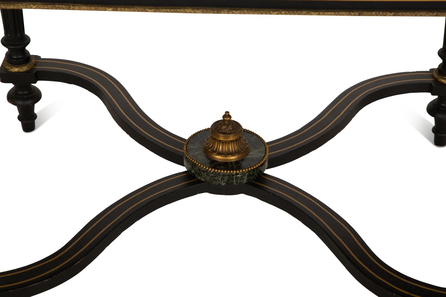A Napoleon III Style Gilt-Bronze Mounted Ebonized Center Table