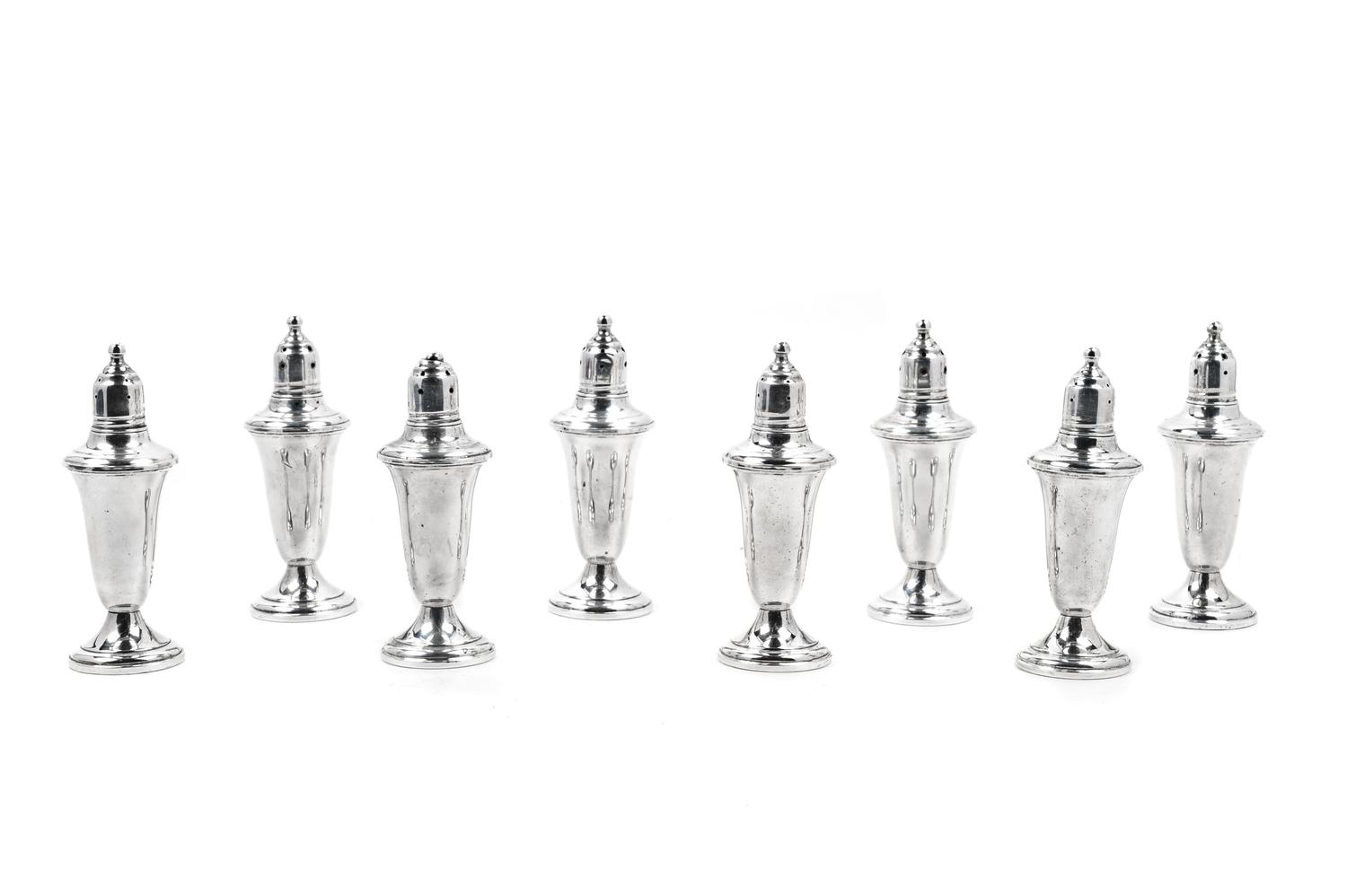 A Set of Eight American Silver Weighted Casters