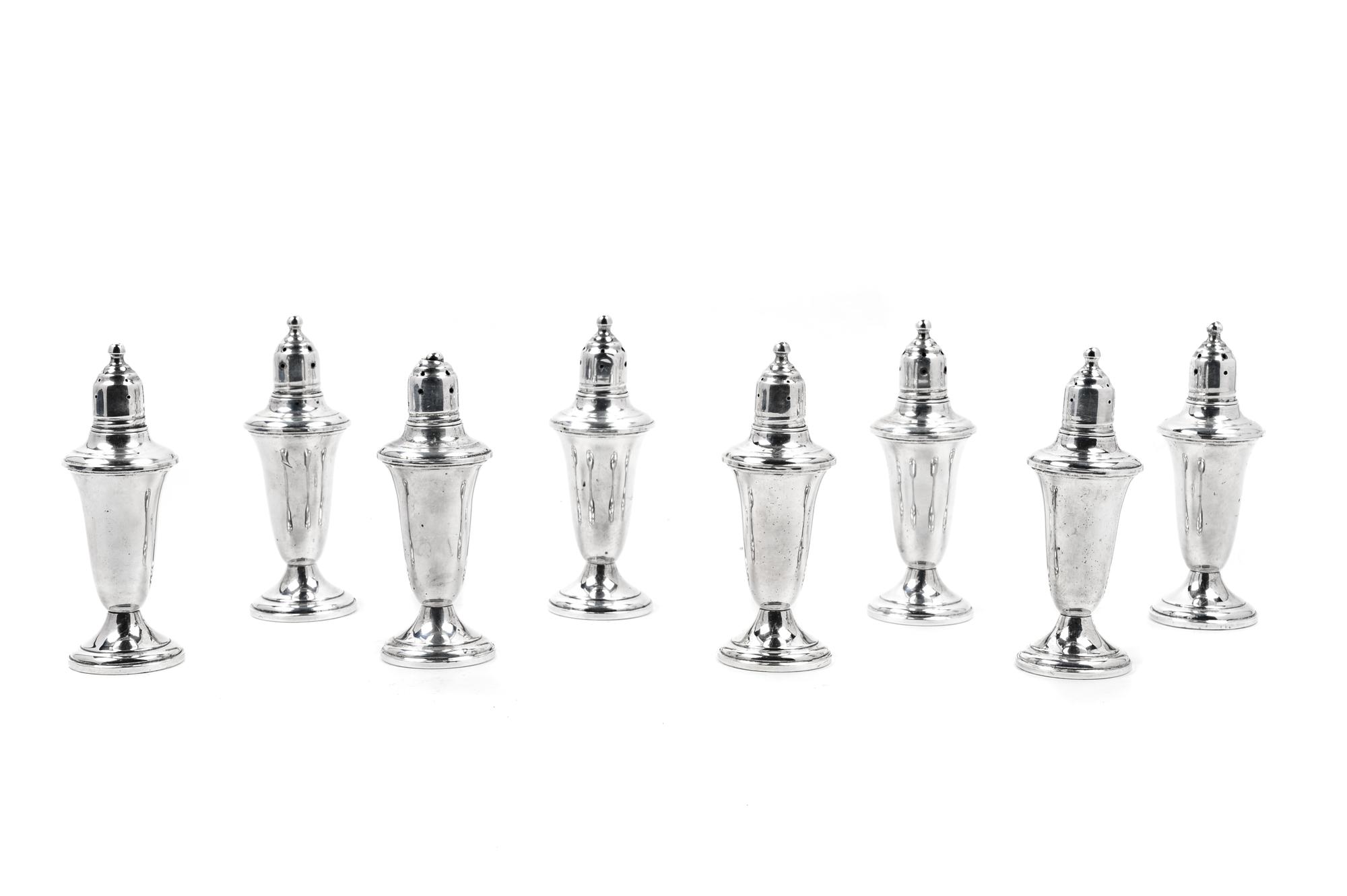A Set of Eight American Silver Weighted Casters