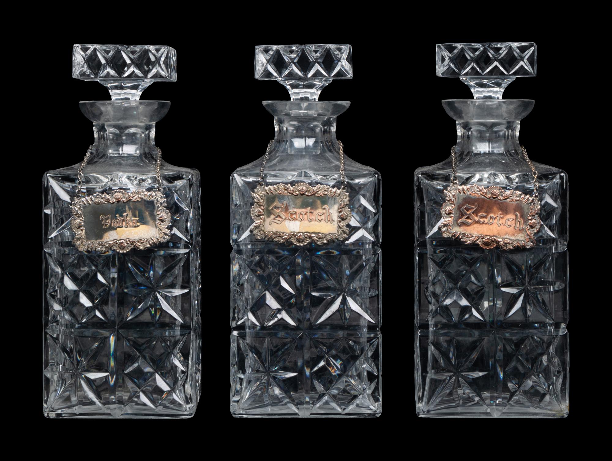 Three Cut Glass Decanters
