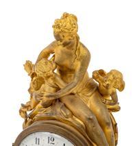 A French Gilt Bronze Figural Mantel Clock