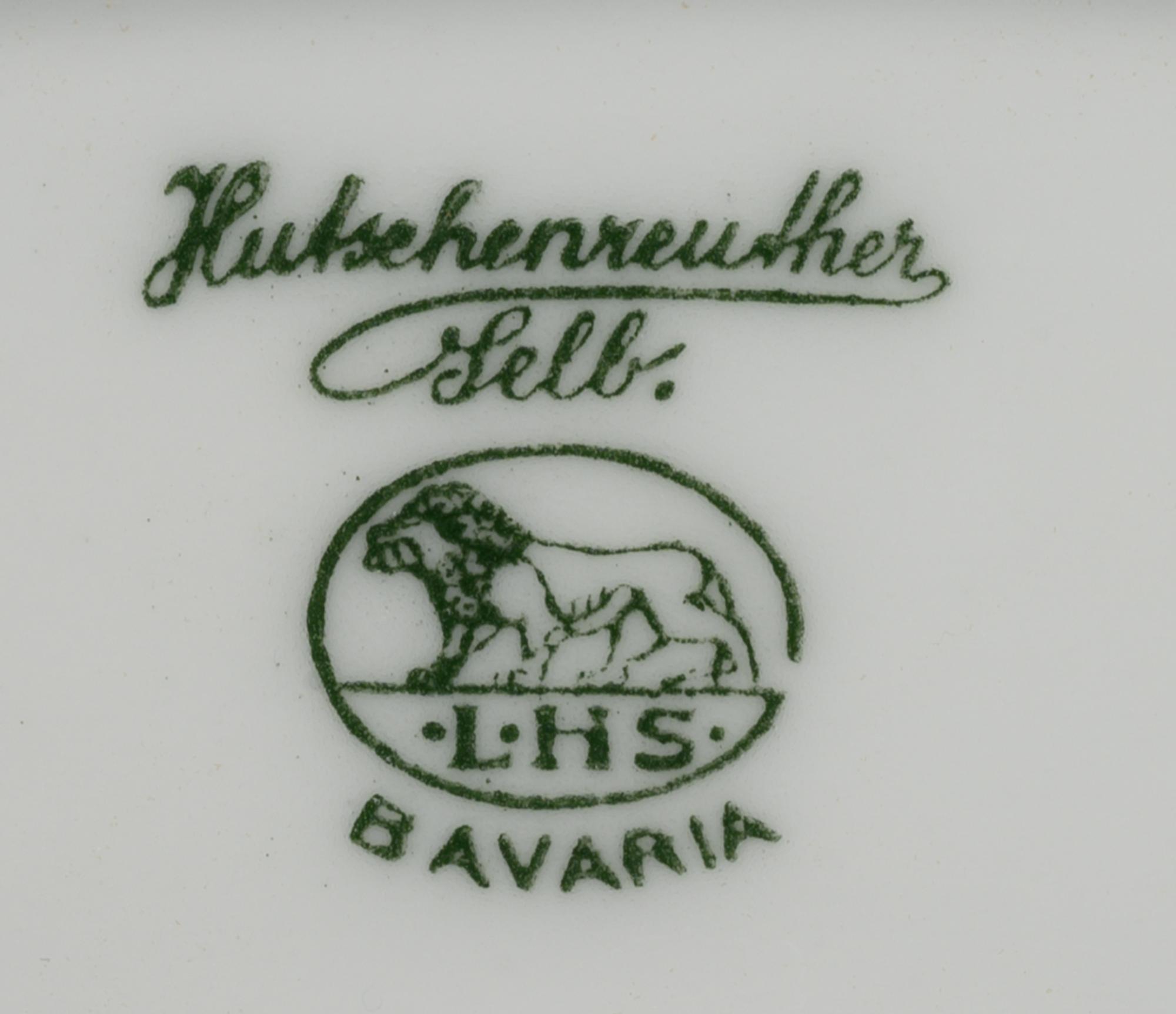 A Hutschenreuther Porcelain Dinner Service