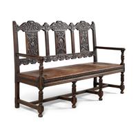 A Continental Carved Oak Hall Bench