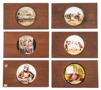 [CIVIL WAR - MAGIC LANTERN SLIDES]. A collection of 148 hand-colored glass slides featuring illustrations of Civil War military and political figures, events, cartoons, genre scenes, and more, including: