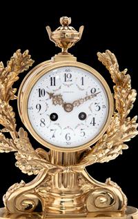 A French Gilt Bronze and Marble Clock, Charles Hour, Retailed by Tiffany & Co.