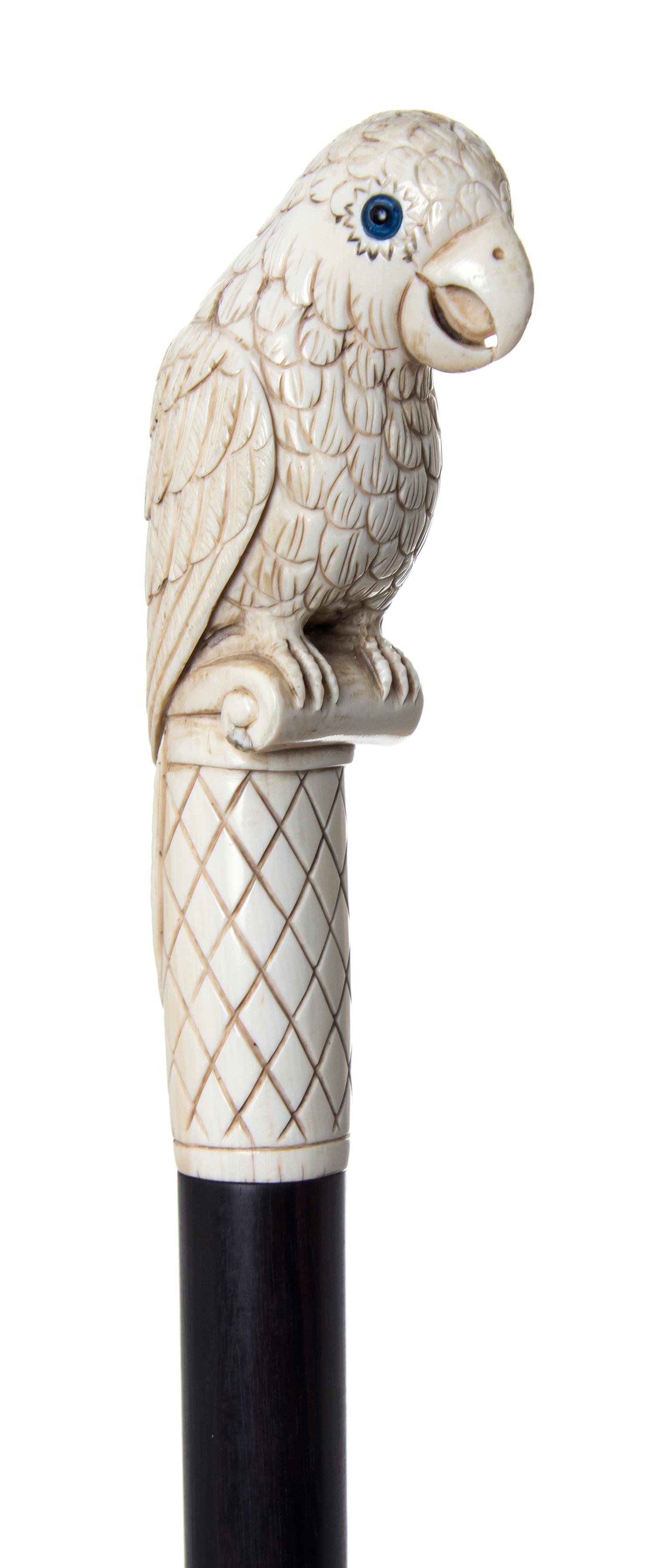An American Ivory Handled Walking Stick, Length of handle 4 5/8 x length overall 34 1/4 inches.