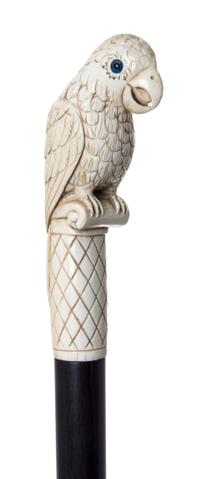 An American Ivory Handled Walking Stick, Length of handle 4 5/8 x length overall 34 1/4 inches.