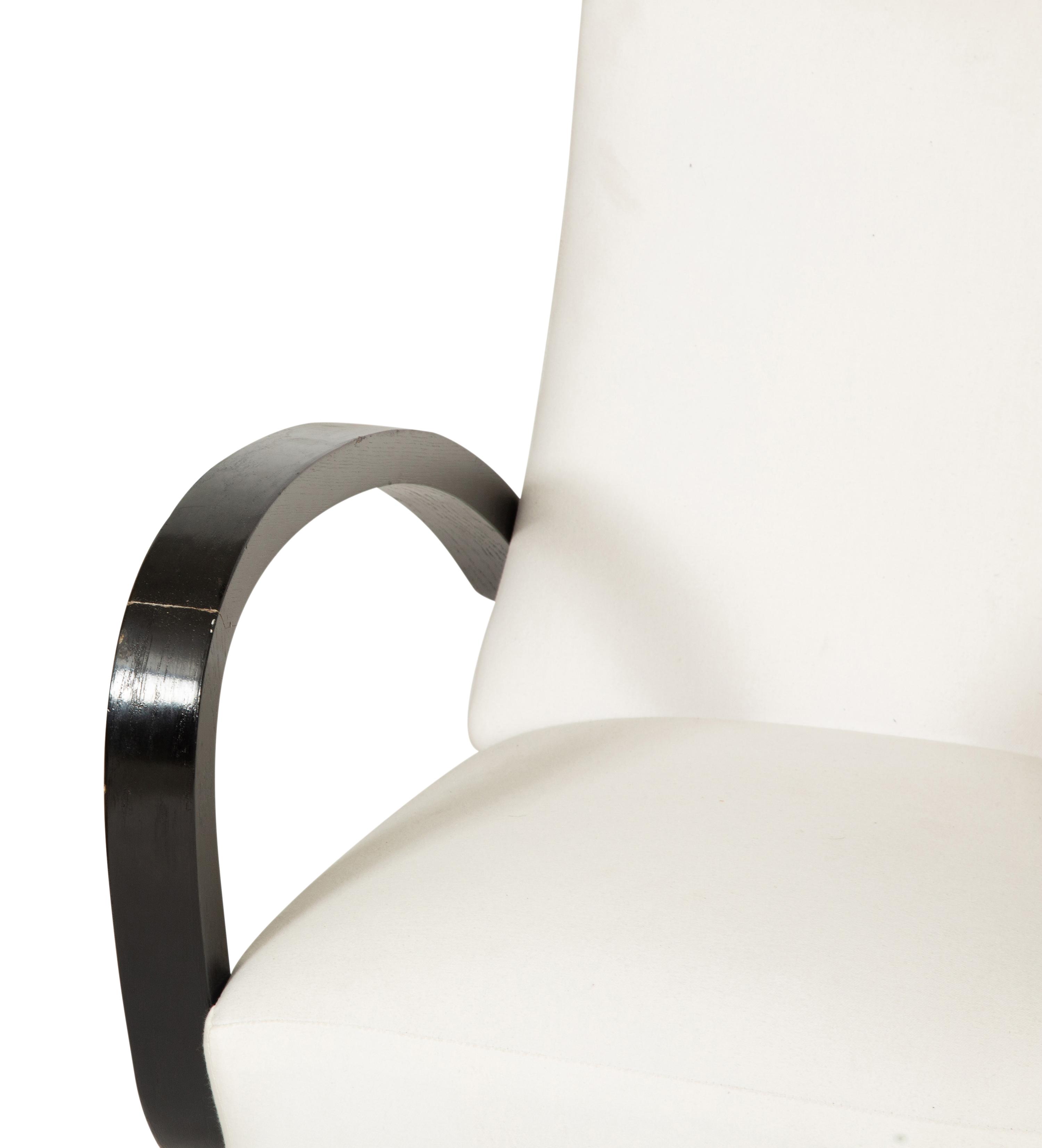 A Pair of Ebonized Oak Lounge Chairs