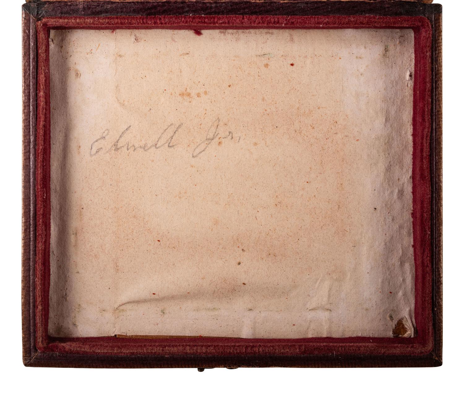[EARLY PHOTOGRAPHY]. Sixth plate daguerreotype portrait of a pair of young brothers wearing blue jackets and embracing in a loving pose.
