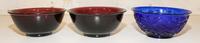 Three Chinese Peking Glass Bowls Diameter of largest 6 1/2 inches.