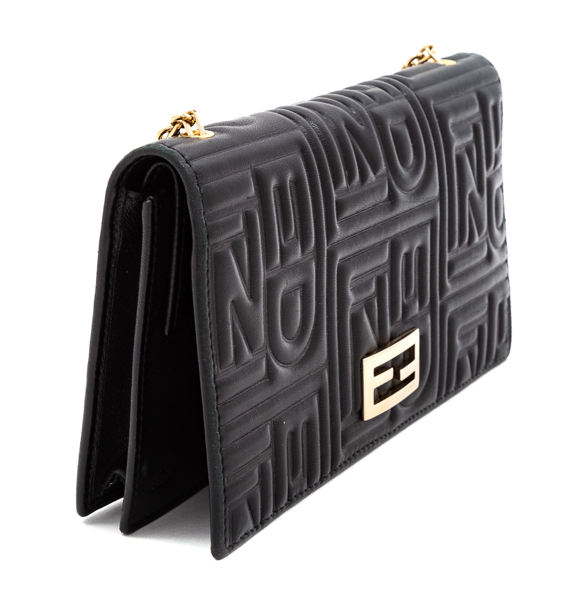 A Fendi Black Monogram Embossed Leather Wallet/Shoulder Bag, 7.5" L x .75" W x 4" H; Chain strap drop: 19".