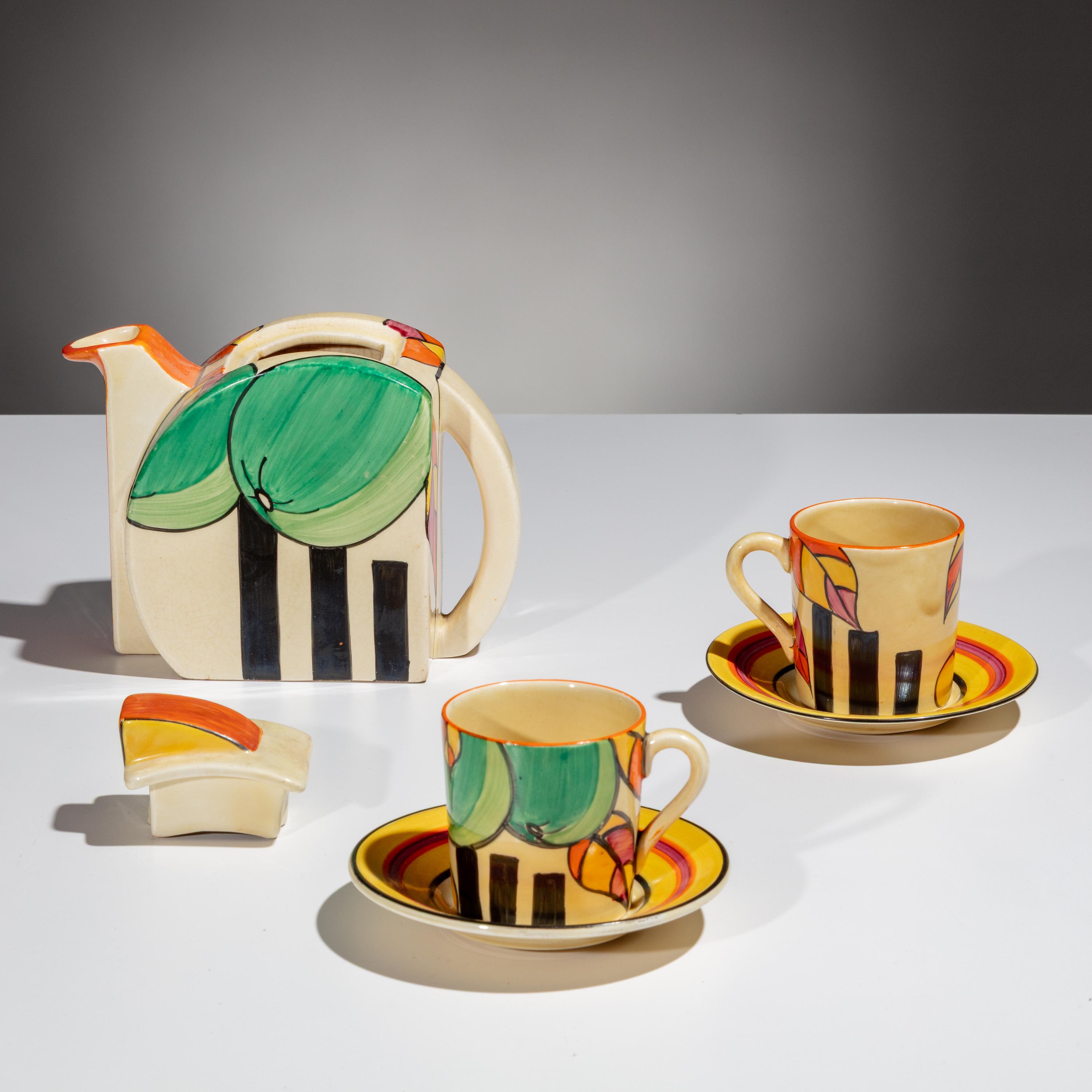 Clarice Cliff (English, 1899–1972) — Apples pattern Teapot and Two Cups w/ saucers, 5 pieces