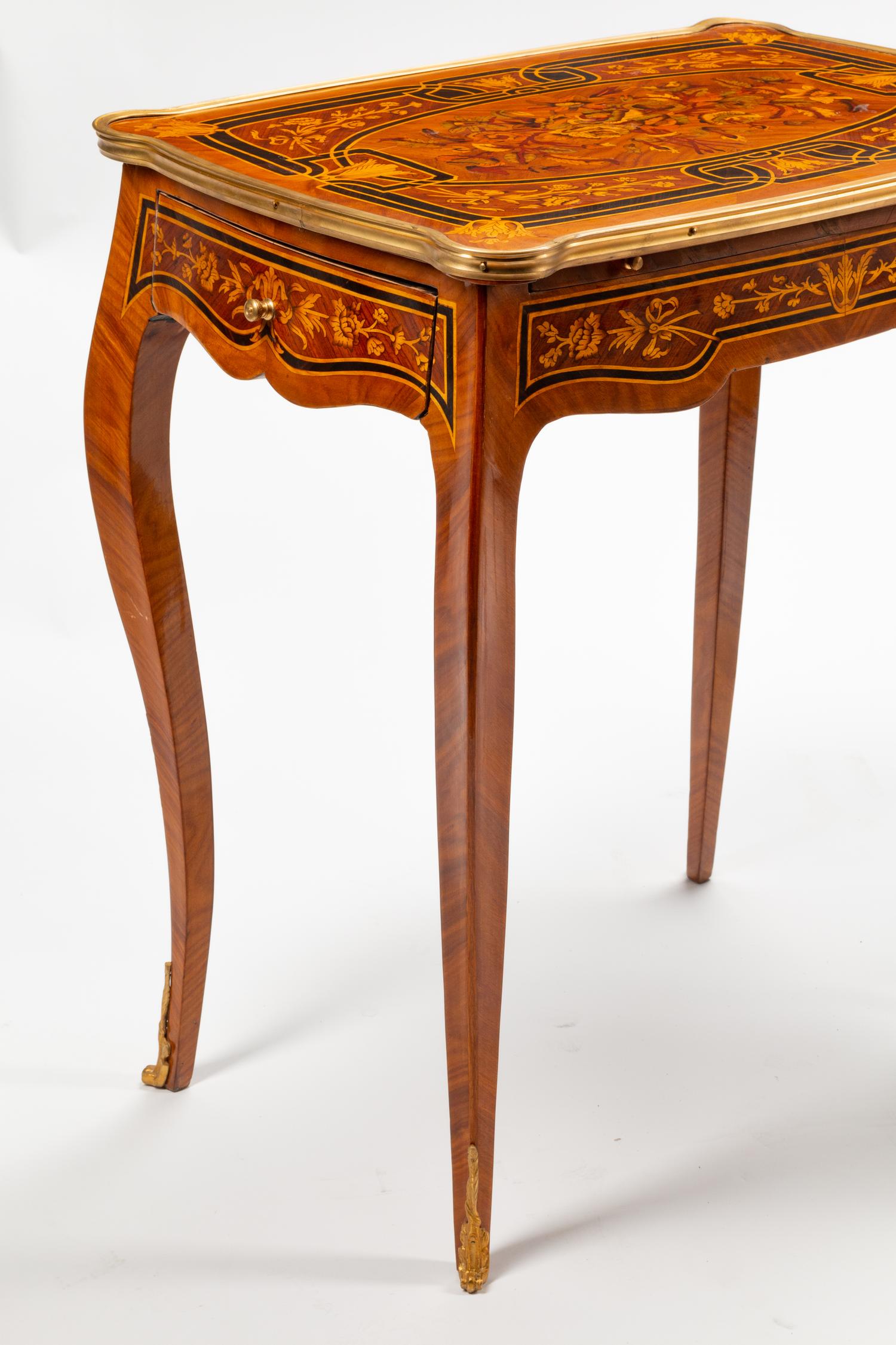 A Pair of Louis XV Style Gilt Bronze Mounted Marquetry Side Tables