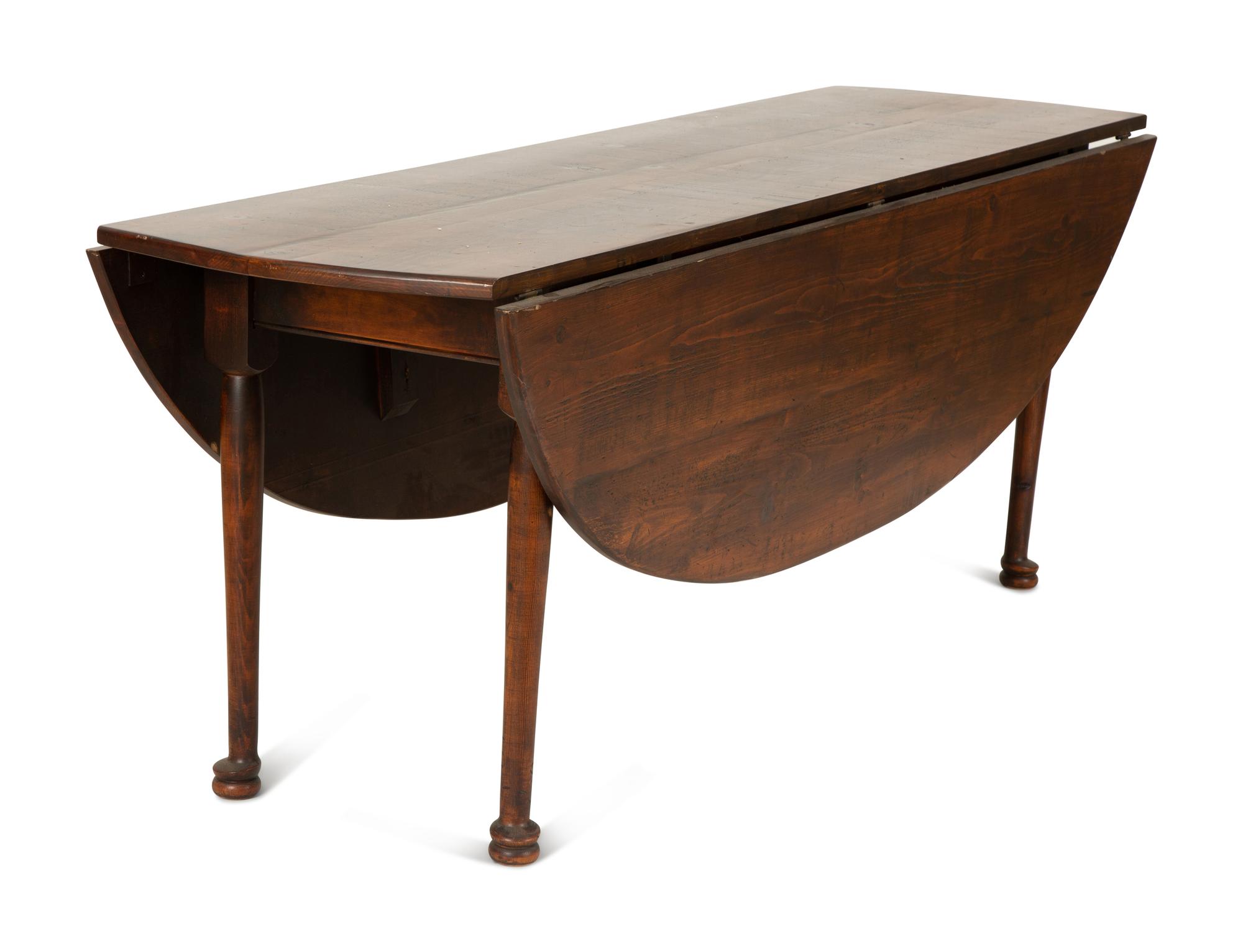 A Queen Anne Style Stained Pine Drop Leaf Gate Leg Dining Table — 20th Century