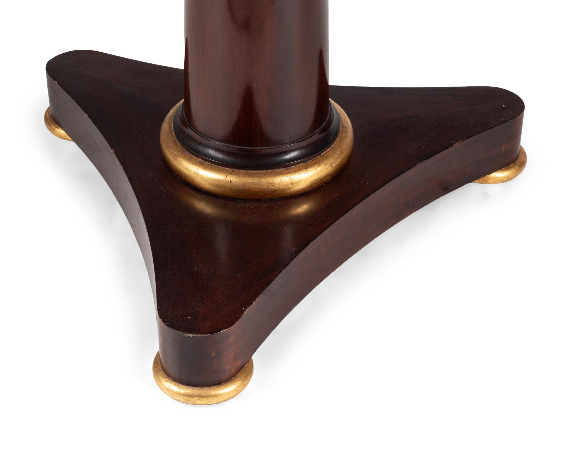 An Empire Style Parcel Gilt Mahogany Marble-Top Center Table