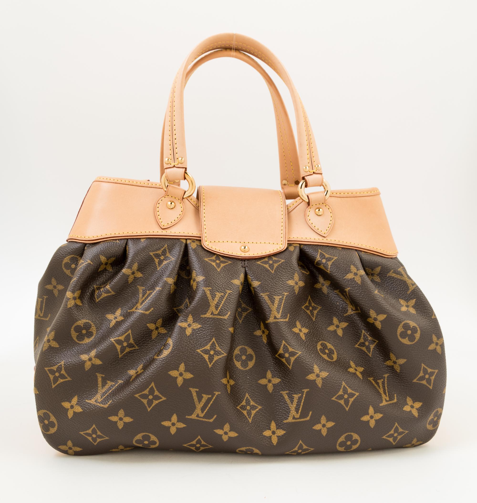 A Louis Vuitton Monogram Boetie PM, 13" x 9" x 4.5"; Handle drop: 6".