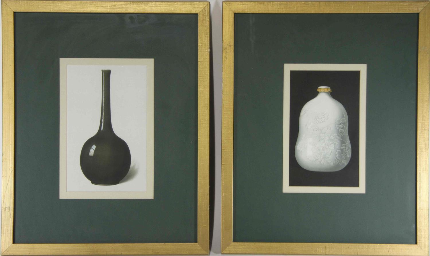 A Group of Four Ceramic Plates Height of tallest 22 1/2 inches.